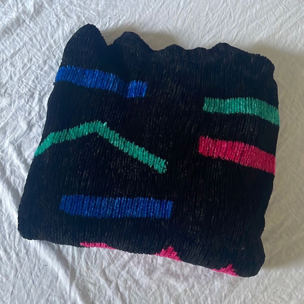 Vintage black sweater with abstract lines